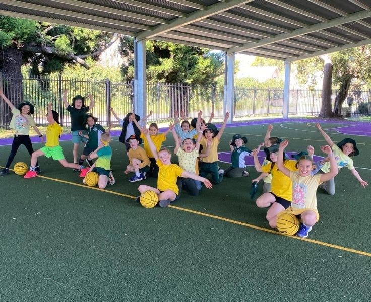 A group of students cheering.